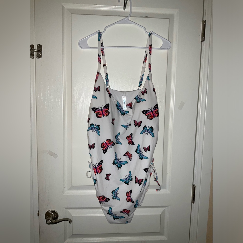 One piece bathing suit from Rue 21. Never worn